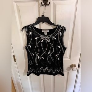 Sleeveless top. Dressy. Size L. Lauren Michelle